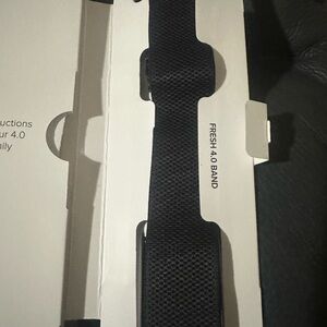 Whoop 4.0 brand new in box black band with blue sportflex silicone band